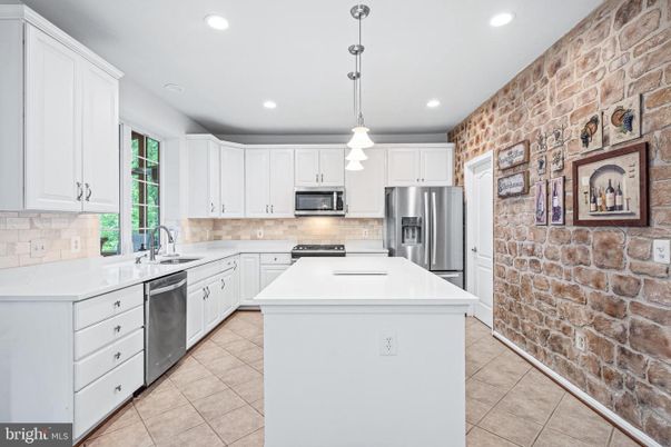 Interior, Kitchen, Pendant Lights, Recessed Lighting, Stainless Steel Appliances, Stone Walls