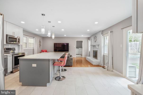 Fireplace, Interior, Kitchen, Pendant Lights, Recessed Lighting, Stainless Steel Appliances, Wood Texture Flooring