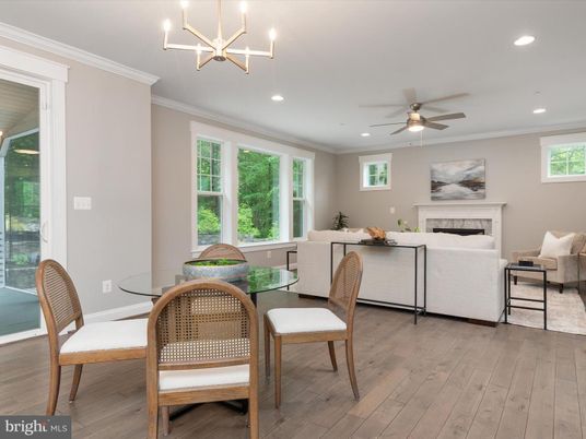 Dining room, Fireplace, Interior, Living room, Pendant Lights, Recessed Lighting, Wood Texture Flooring