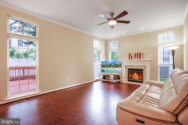 Empty room, Fireplace, Interior, Living room, Recessed Lighting, Wood Texture Flooring