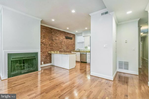 Fireplace, Interior, Kitchen, Recessed Lighting, Stone Walls, Wood Texture Flooring