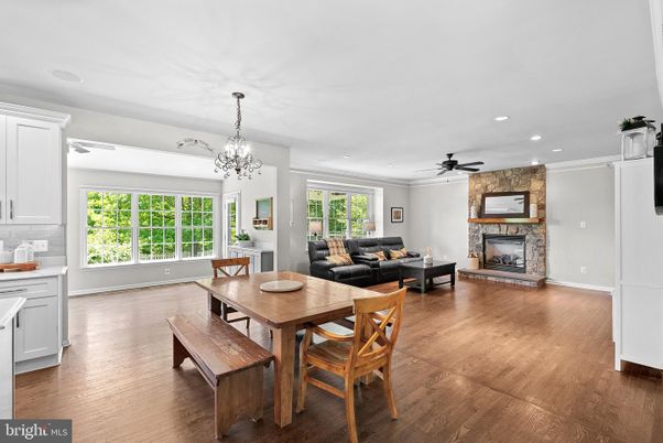 Chandelier, Dining room, Fireplace, Interior, Living room, Recessed Lighting, Wood Texture Flooring