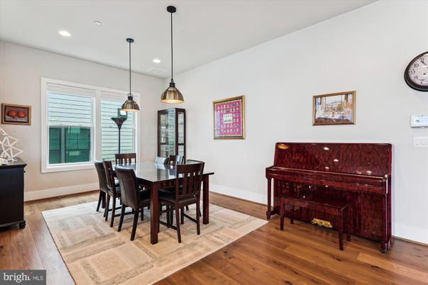 Dining room, Interior, Pendant Lights, Piano, Recessed Lighting, Wood Texture Flooring