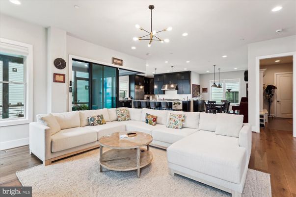 Dining room, Interior, Kitchen, Living room, Pendant Lights, Recessed Lighting, Stainless Steel Appliances, Wood Texture Flooring