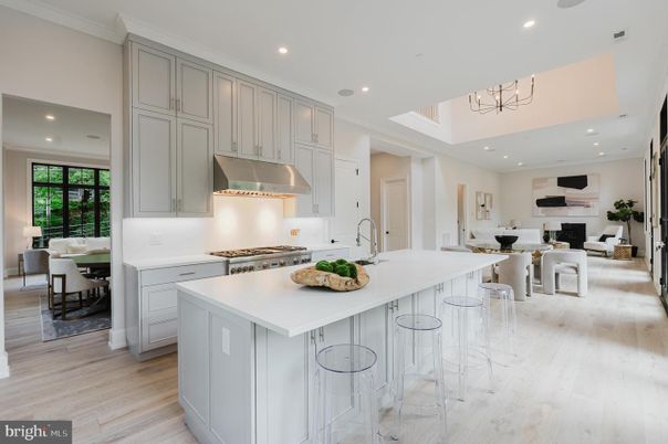 Dining room, Fireplace, Interior, Kitchen, Living room, Recessed Lighting, Stainless Steel Appliances, Wood Texture Flooring