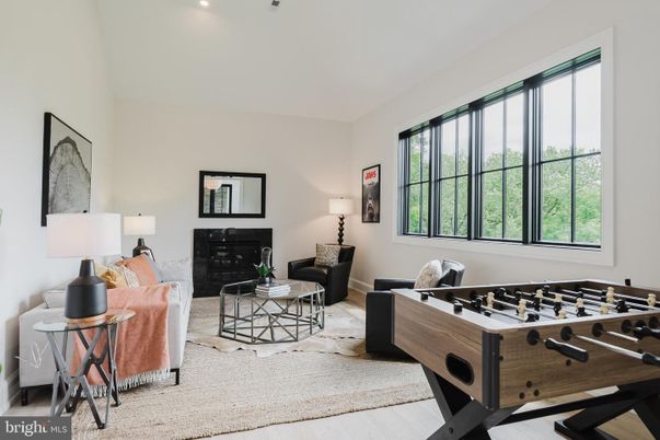Fireplace, Game Room, Interior, Living room, Recessed Lighting, Wood Texture Flooring