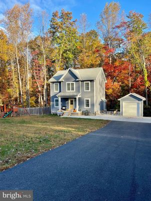 Backyard, Detached Garage, Exterior, Facade, Raised Ranch