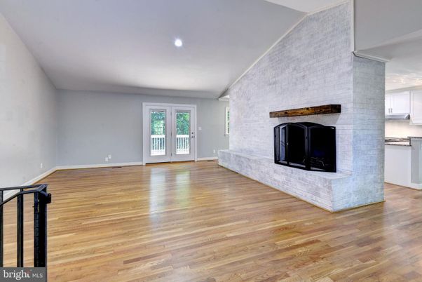Empty room, Fireplace, Interior, Recessed Lighting, Wood Texture Flooring
