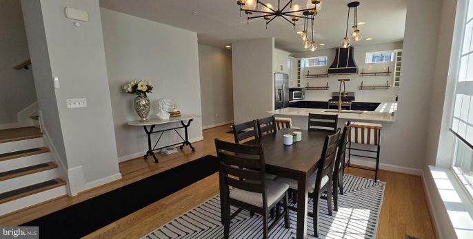 Dining room, Interior, Kitchen, Pendant Lights, Recessed Lighting, Stainless Steel Appliances, Wood Texture Flooring