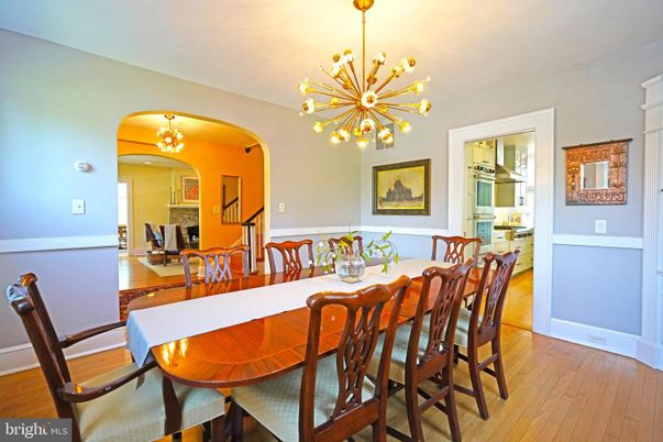 Chandelier, Dining room, Fireplace, Interior, Pendant Lights, Wood Texture Flooring