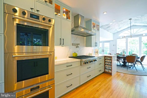 Dining room, Interior, Kitchen, Recessed Lighting, Stainless Steel Appliances, Wood Texture Flooring