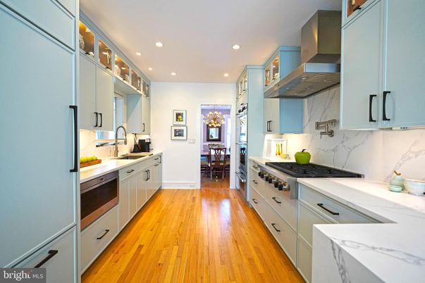 Dining room, Interior, Kitchen, Marble Walls, Recessed Lighting, Stainless Steel Appliances, Wood Texture Flooring