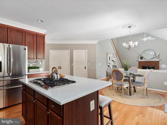 Chandelier, Dining room, Interior, Kitchen, Recessed Lighting, Stainless Steel Appliances, Wood Texture Flooring