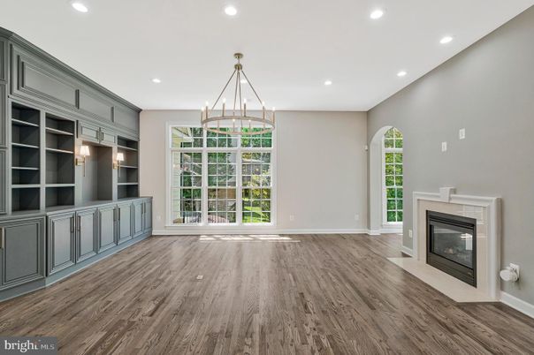 Empty room, Fireplace, Interior, Pendant Lights, Recessed Lighting, Wood Texture Flooring
