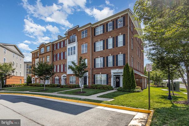 Exterior, Facade, Brick Facade, Condo Building