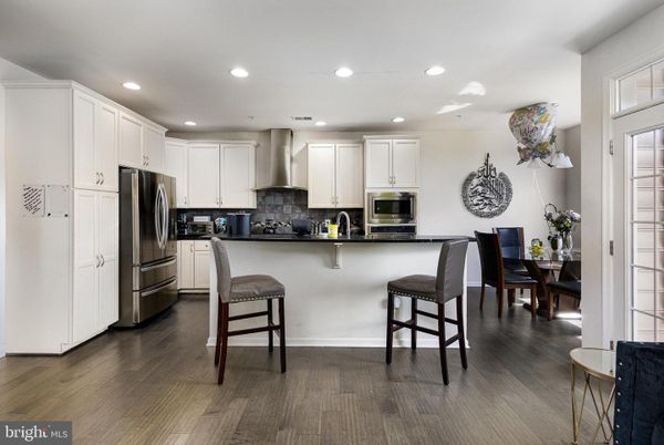 Dining room, Interior, Kitchen, Recessed Lighting, Stainless Steel Appliances, Wood Texture Flooring