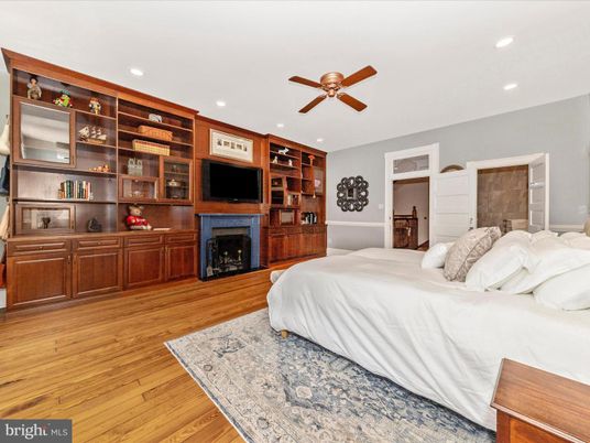 Bedroom, Fireplace, Interior, Recessed Lighting, Wood Texture Flooring