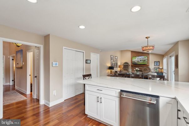 Dining room, Interior, Kitchen, Recessed Lighting, Stainless Steel Appliances, Wood Texture Flooring