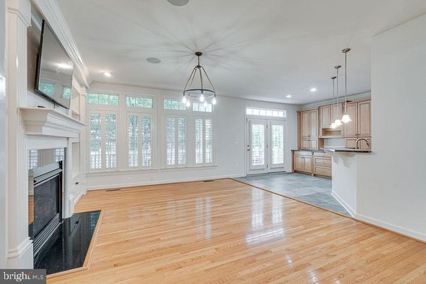 Empty room, Fireplace, Interior, Kitchen, Pendant Lights, Recessed Lighting, Wood Texture Flooring