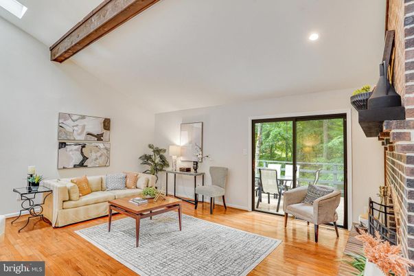 Fireplace, Interior, Living room, Recessed Lighting, Stone Walls, Wood Texture Flooring