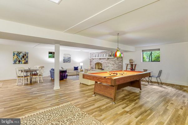 Billiard Table, Dining room, Game Room, Interior, Pendant Lights, Stone Walls, Wood Texture Flooring