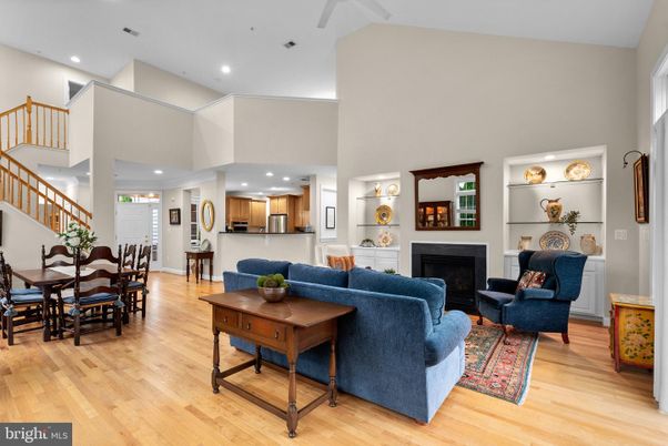 Dining room, Fireplace, Interior, Living room, Recessed Lighting, Wood Texture Flooring