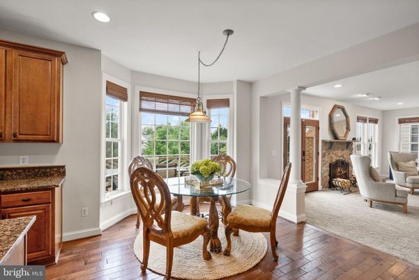Dining room, Fireplace, Interior, Pendant Lights, Recessed Lighting, Wood Texture Flooring