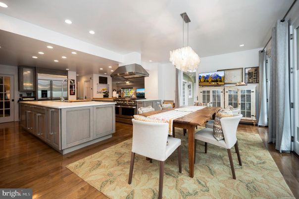 Chandelier, Dining room, Interior, Kitchen, Pendant Lights, Recessed Lighting, Stainless Steel Appliances, Wood Texture Flooring