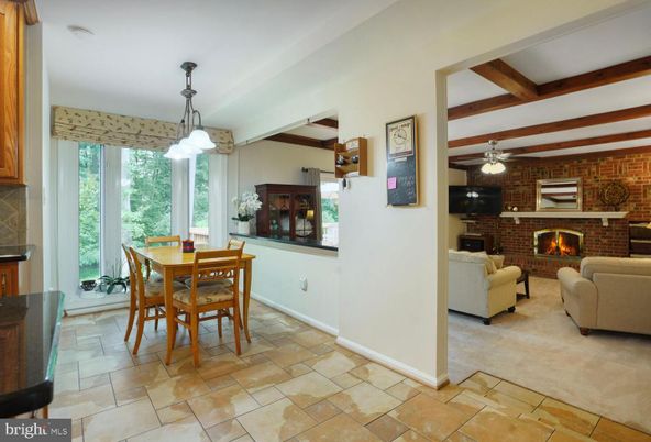 Dining room, Fireplace, Interior, Living room, Pendant Lights, Stone Walls, Wooden Beams