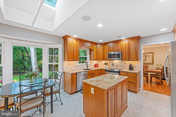 Dining room, Interior, Kitchen, Recessed Lighting, Stainless Steel Appliances, Wood Texture Flooring