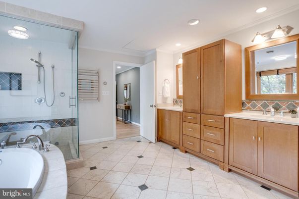 Bathroom, Dual Sink Vanities, Glass Shower, Interior, Recessed Lighting, Wood Texture Flooring