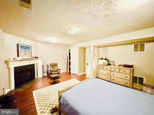 Bedroom, Fireplace, Interior, Wood Texture Flooring