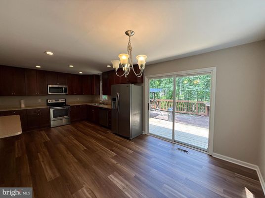 Chandelier, Interior, Kitchen, Recessed Lighting, Stainless Steel Appliances, Wood Texture Flooring