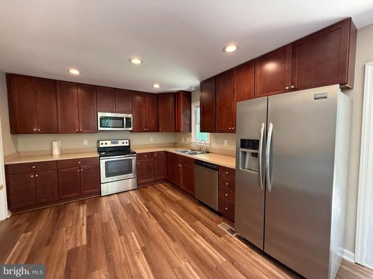 Interior, Kitchen, Recessed Lighting, Stainless Steel Appliances, Wood Texture Flooring