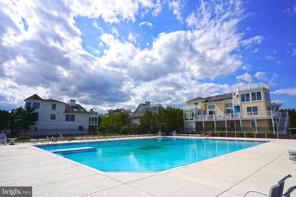 Exterior, Pool, Solar Panels