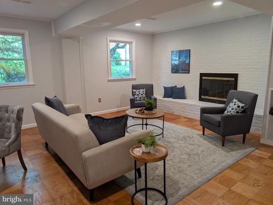 Fireplace, Interior, Living room, Recessed Lighting, Stone Walls, Wood Texture Flooring