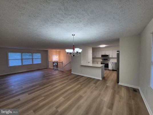 Chandelier, Empty room, Interior, Kitchen, Stainless Steel Appliances, Wood Texture Flooring