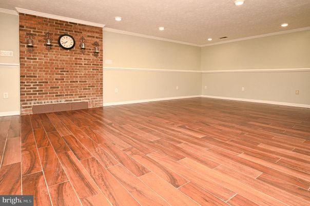 Empty room, Interior, Recessed Lighting, Stone Walls, Wood Texture Flooring