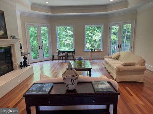 Dining room, Fireplace, Interior, Living room, Recessed Lighting, Wood Texture Flooring