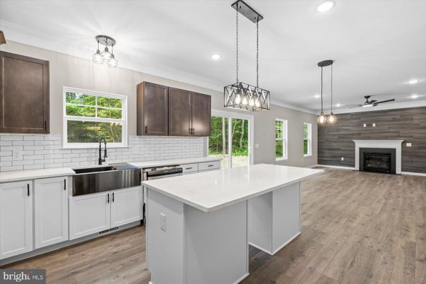 Fireplace, Interior, Kitchen, Pendant Lights, Recessed Lighting, Stainless Steel Appliances, Wood Texture Flooring