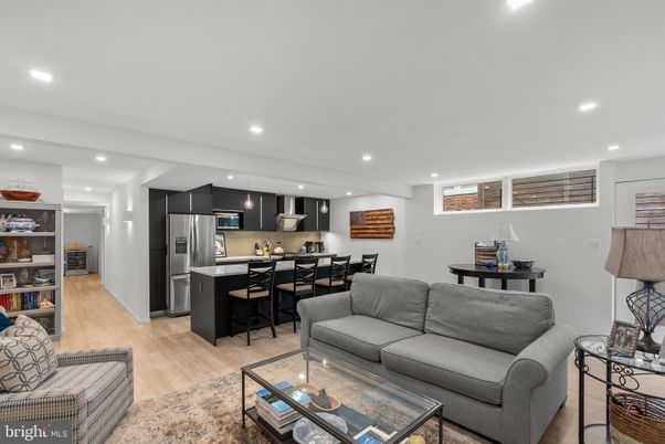 Dining room, Interior, Kitchen, Living room, Recessed Lighting, Stainless Steel Appliances, Wood Texture Flooring