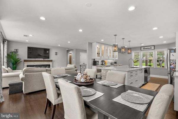 Dining room, Fireplace, Interior, Kitchen, Living room, Pendant Lights, Recessed Lighting, Wood Texture Flooring