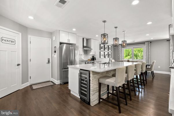 Dining room, Interior, Kitchen, Pendant Lights, Recessed Lighting, Stainless Steel Appliances, Wood Texture Flooring