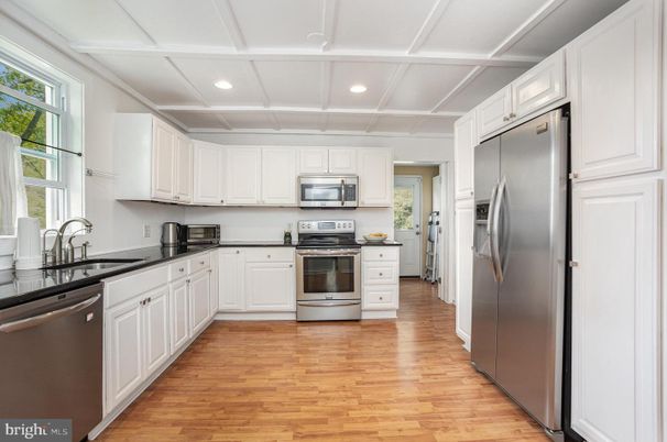Interior, Kitchen, Recessed Lighting, Stainless Steel Appliances, Wood Texture Flooring