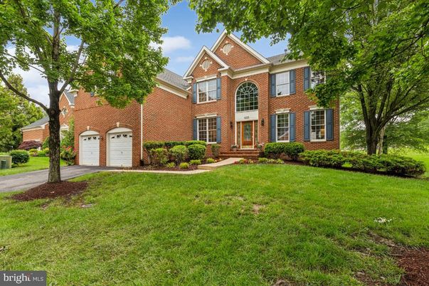 Attached, Backyard, Exterior, Facade, Brick Facade, Brick Traditional