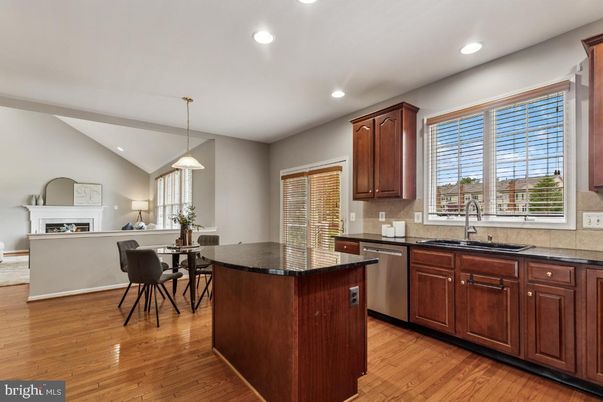 Dining room, Fireplace, Interior, Kitchen, Pendant Lights, Recessed Lighting, Wood Texture Flooring