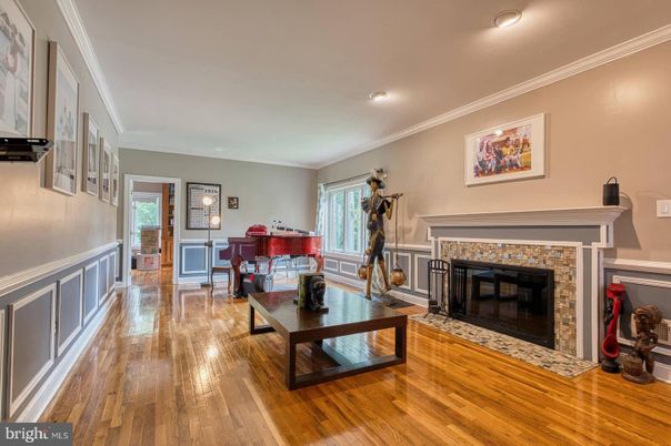 Fireplace, Interior, Living room, Piano, Recessed Lighting, Wood Texture Flooring