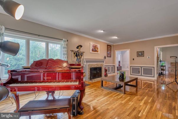Fireplace, Interior, Piano, Recessed Lighting, Wood Texture Flooring
