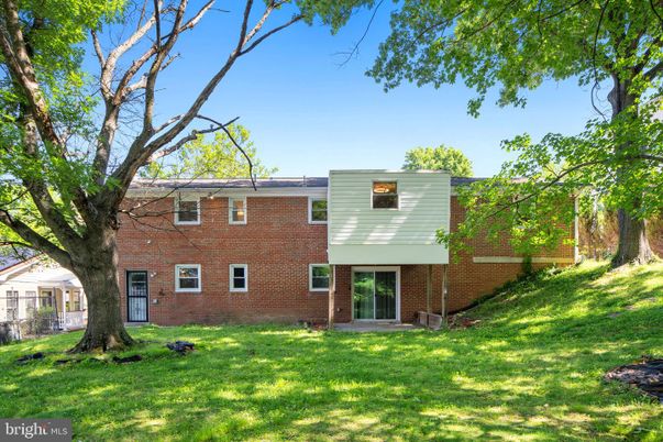 Backyard, Exterior, Facade, Brick Facade, Raised Ranch