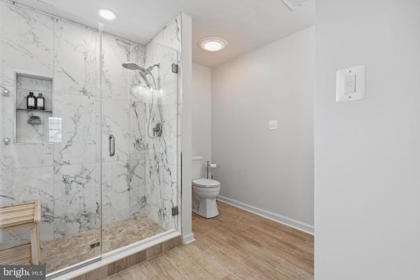 Bathroom, Glass Shower, Interior, Marble Walls, Recessed Lighting, Wood Texture Flooring